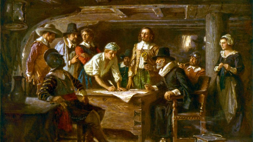 Cestující na lodi Mayflower podepisují cestou do Ameriky tzv. Mayflowerská kompaktáta