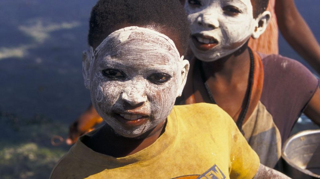 Cabo Delgado (Mozambique Cabo Delgado Pemba children with natural facemasks which protect from the sun and soften skin)