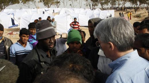 Migranti v uprchlickém táboře na hranicích mezi Tuniskem a Libyí