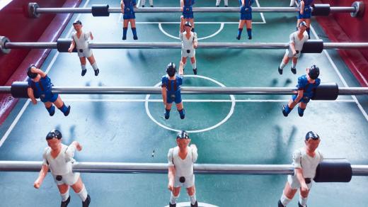 Stolní fotbal (Table football, elevated view)
