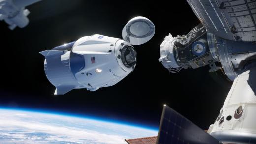 Vizualizace kosmické lodi Crew Dragon a Mezinárodní vesmírné stanice 